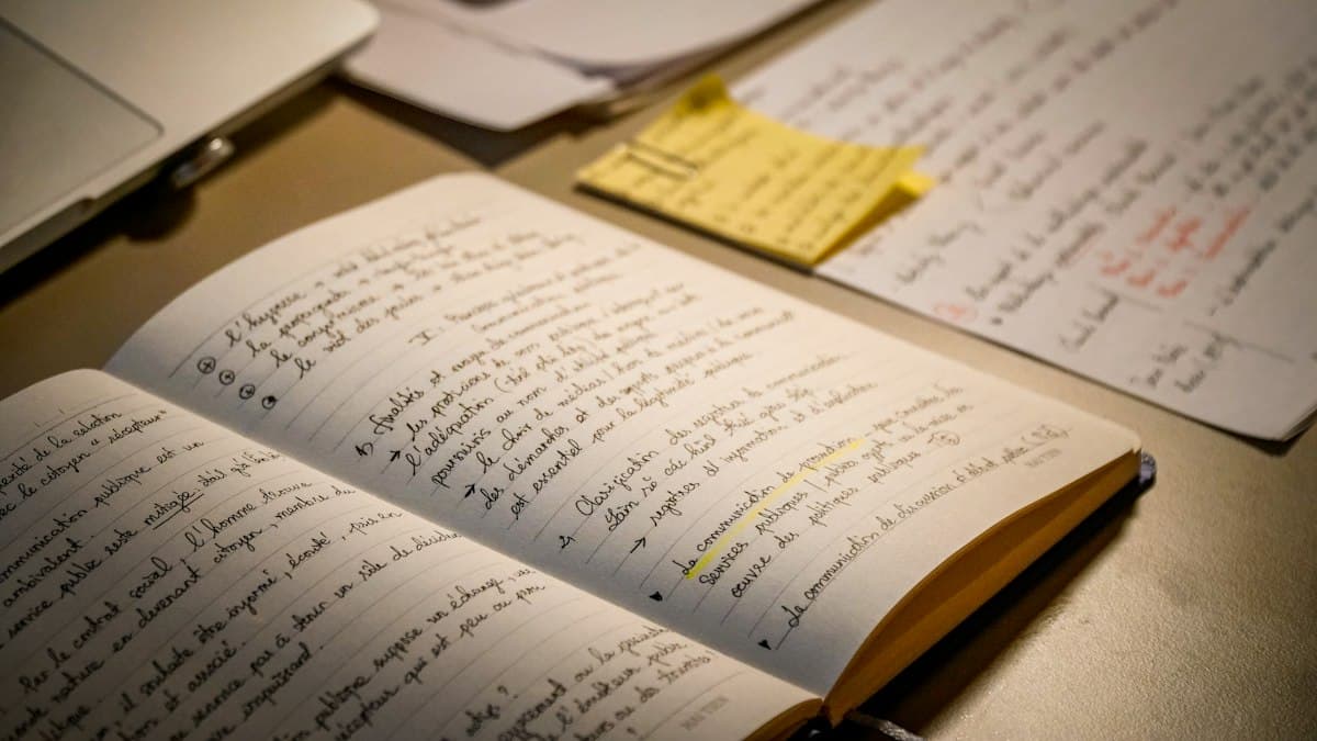 An open notebook of handwritten notes